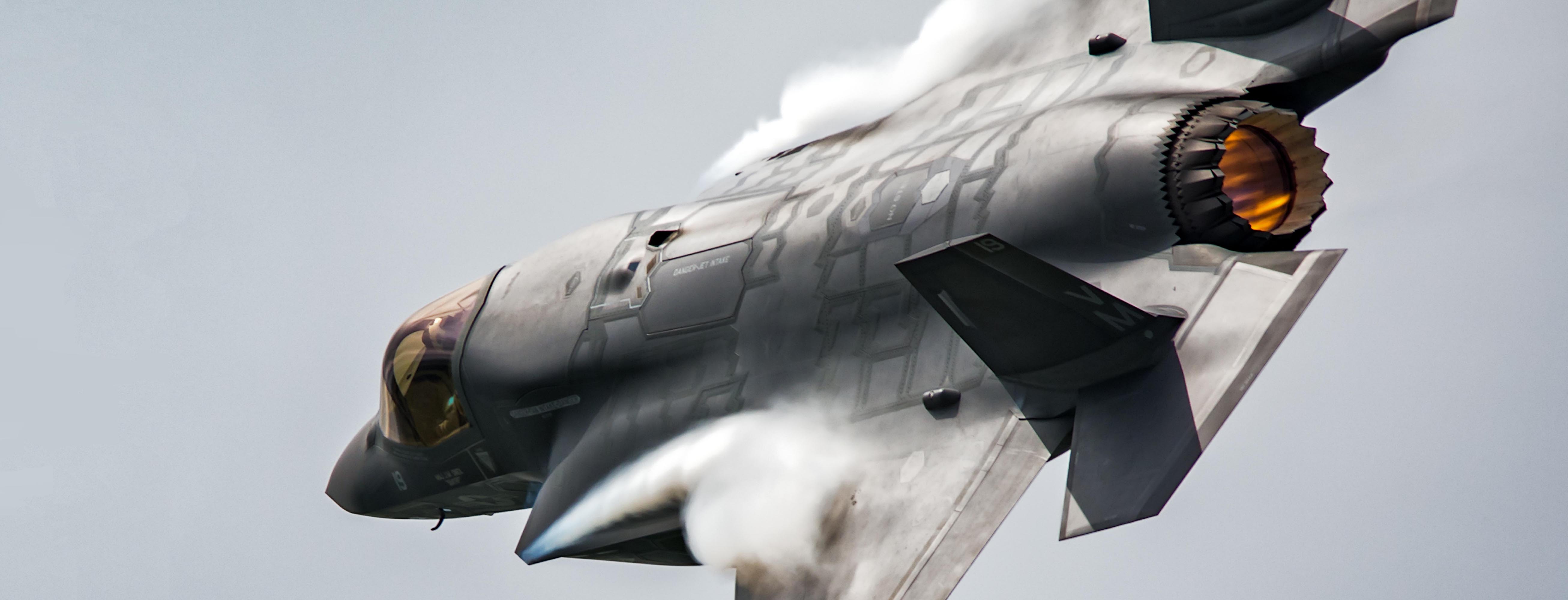 A military aircraft, F-35 Joint Strike Fighter, flying by