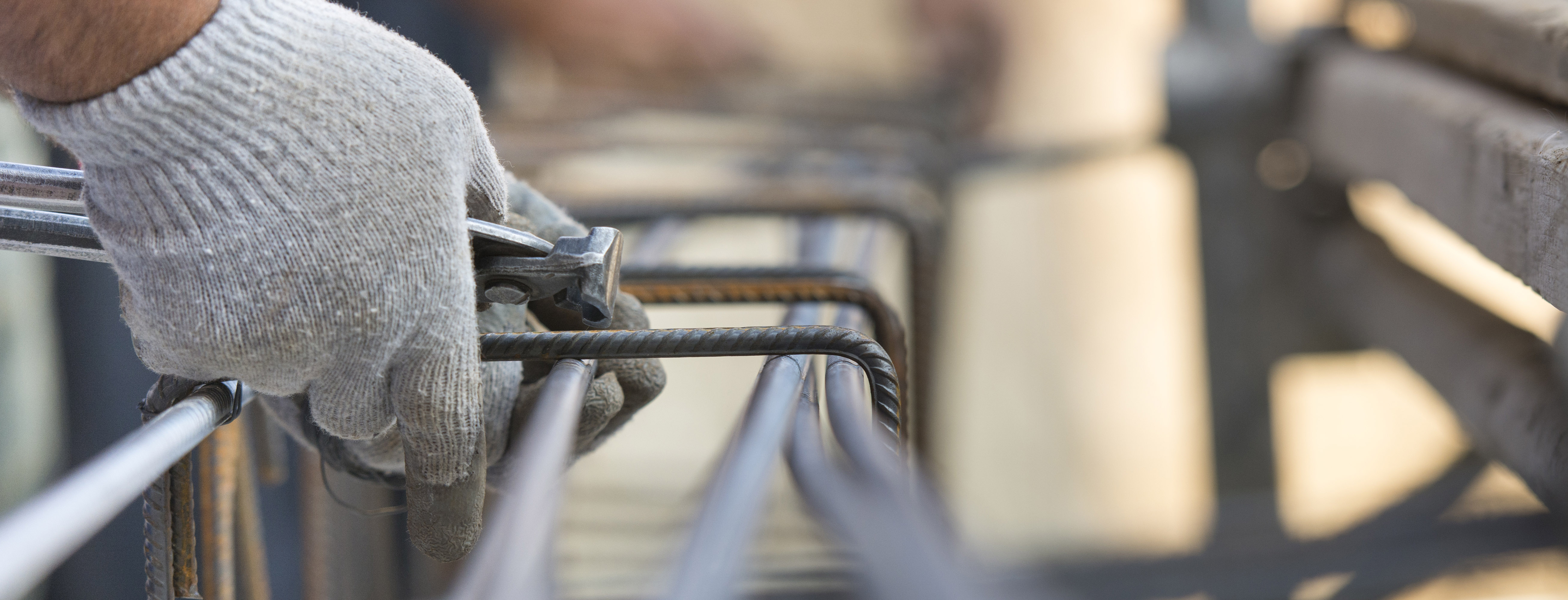 Close up on steel pipes on construction site.